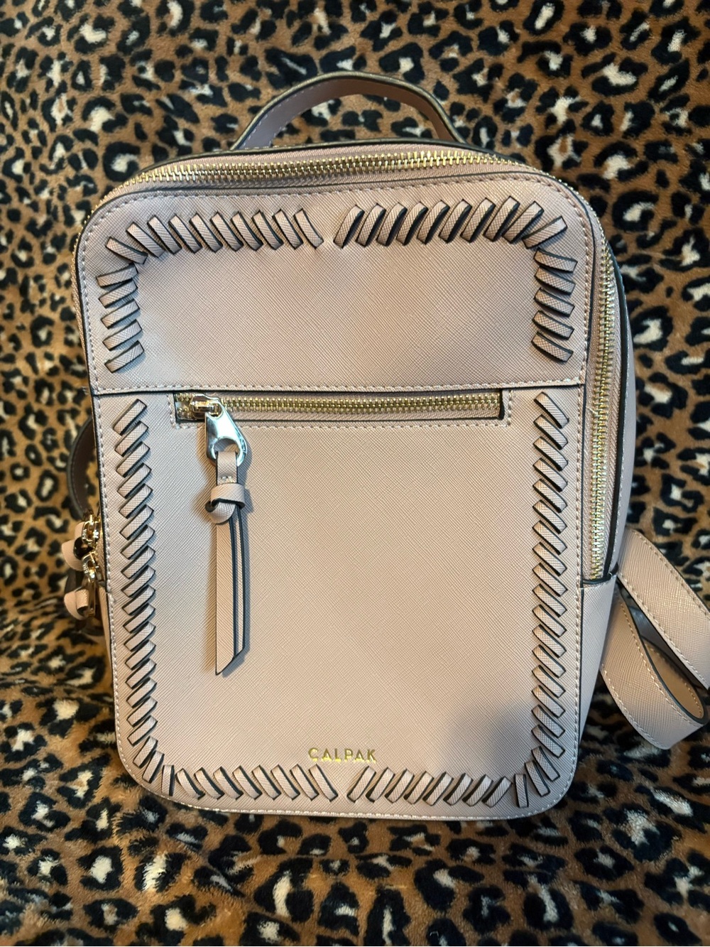 Discontinued CALPAK Kaya Mini Backpack Mauve Whipstitch Dust Bag